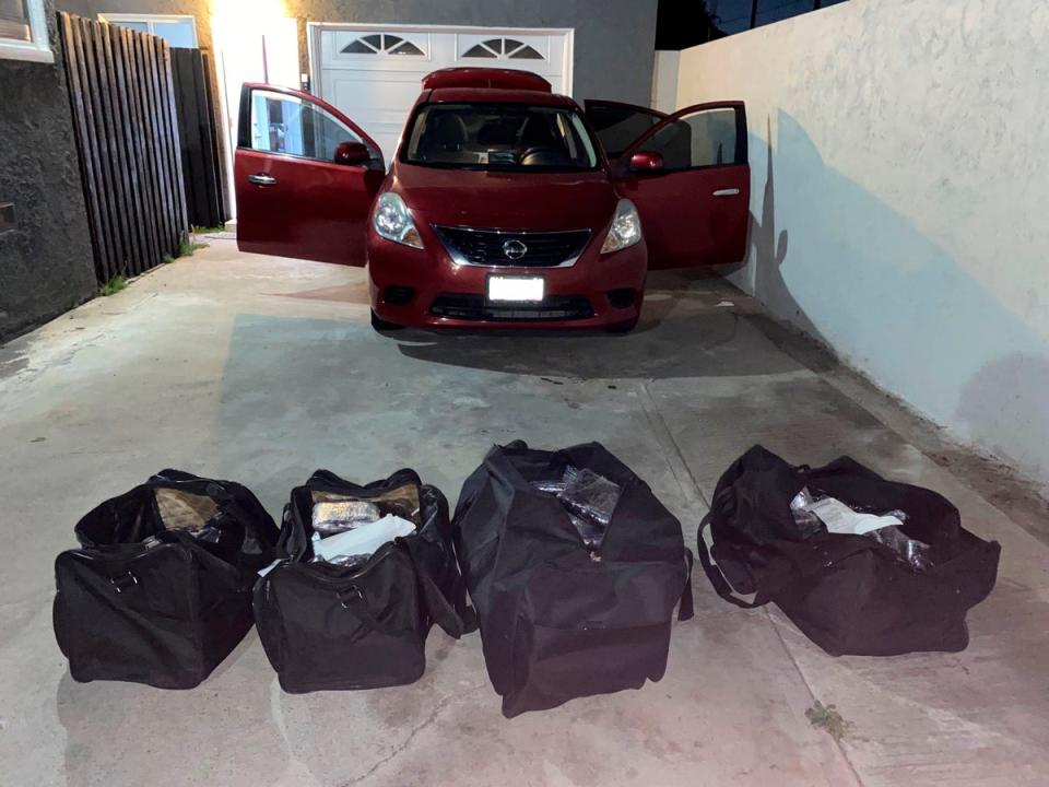 This undated photo provided by the U.S. Drug Enforcement Administration, Los Angeles Field Division, shows bags of some of the seized approximately 1 million fake pills containing fentanyl that were seized when agents served a search warrant, July 5, 2022 (AP)
