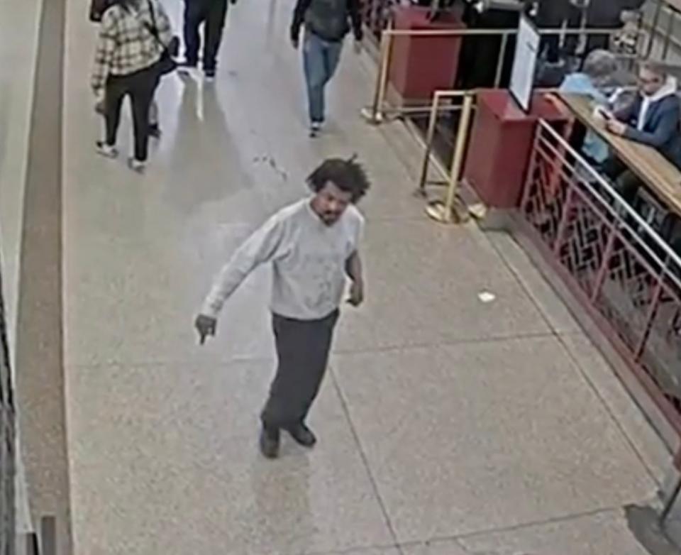 Surveillance video captured Jean Carlos Zarzuela wandering around Grand Central before he allegedl slugged a girl. MTAPD