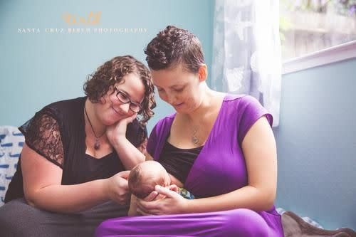 Photo by Santa Cruz Birth Photography; Heidi Olson nurses Sequoia while Mary Ellen sits beside her