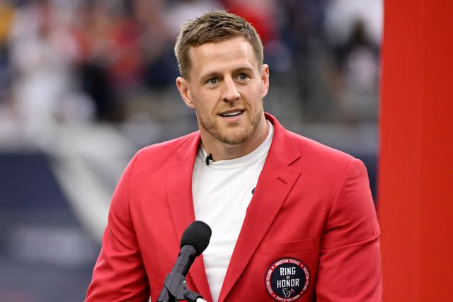 <p>Logan Riely/Getty</p> Former Houston Texans player J.J. Watt speaks during a ceremony inducting him into the Texans Ring of Honor during a game against the Pittsburgh Steelers at NRG Stadium on October 01, 2023 in Houston, Texas