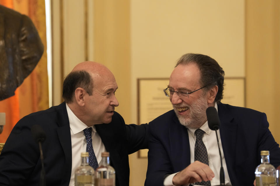 La Scala director Riccardo Chailly, right, smiles with La Scala general manager Dominique Meyer as they attend at a press conference to present the 2023/2024 season, at Milan's La Scala opera house, Italy, Monday, May 29, 2023. (AP Photo/Antonio Calanni)