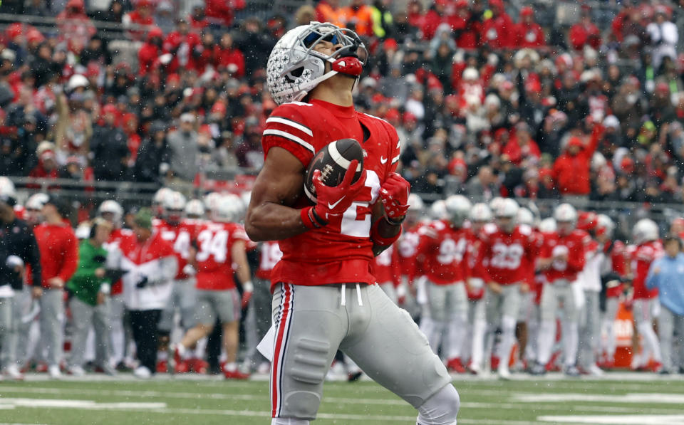 Ohio State wide receiver Emeka Egbuka celebrates his touchdown against Indiana during the first half of an NCAA college football game Saturday, Nov. 12, 2022 in Columbus, Ohio. (AP Photo/Paul Vernon)