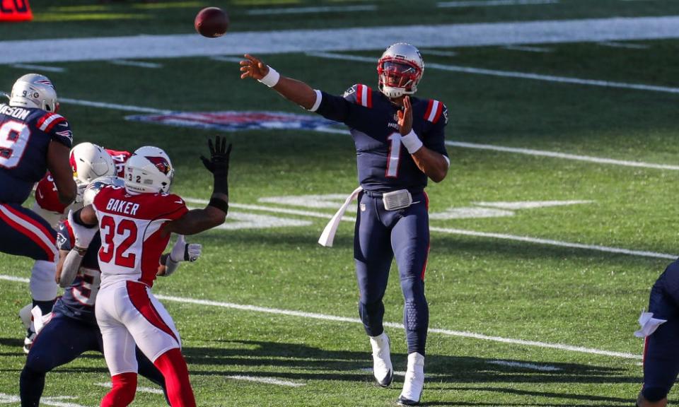 New England Patriots quarterback Cam Newton (1) passes the ball against the Arizona Cardinals during the first half at Gillette Stadium in Foxborough, Massachusetts, on Nov. 29, 2020.