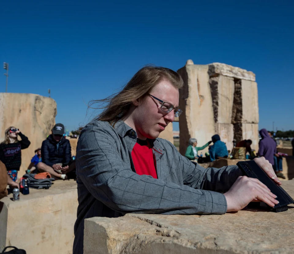 Lead Android Developer, Travis, sets up his phone to capture the 2023 Annular Eclipse during the SunSketcher beta test in Odessa, Texas.