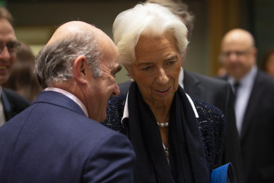 New President of European Central Bank Christine Lagarde, right, talks to European Central Bank Vice President Luis de Guindos during a Finance Ministers Eurogroup meeting at the European Council headquarters in Brussels, Friday, Nov. 8, 2019. (AP Photo/Francisco Seco)