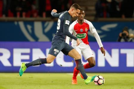 Soccer Football - Paris Saint Germain v AS Monaco - French Cup Semi-Final - Parc des Princes stadium, Paris, France - 26/04/2017. Julian Draxler of Paris Saint Germain in action against Safwan Mbae of AS Monaco. REUTERS/Charles Platiau