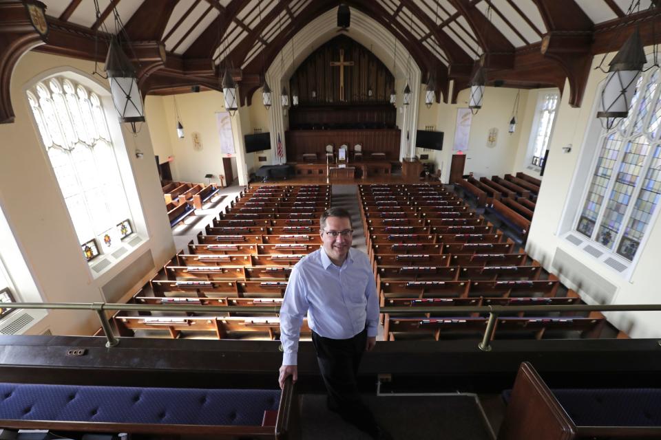 Rev. Markus Wegenast is pictured in the main sanctuary of First United Methodist Church Tuesday, October 3, 2023, in Appleton, Wis. The church is celebrating its 175th anniversary. Wegenast has been with the church since 2014.