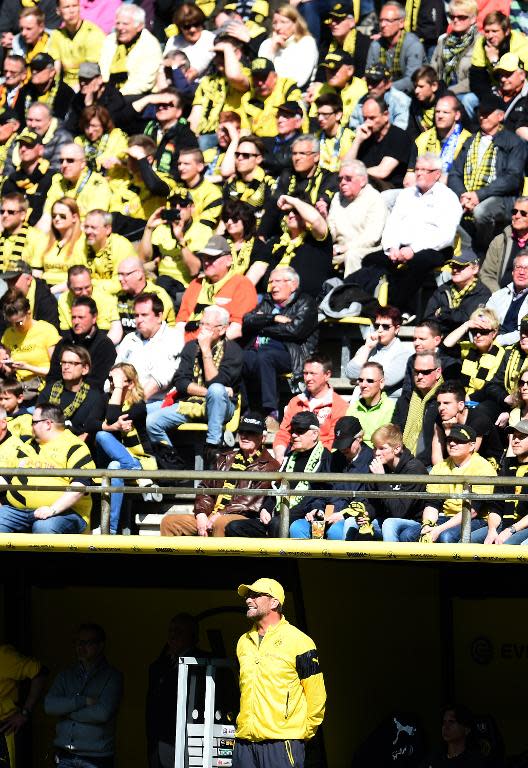 Dortmund's head coach Juergen Klopp reacts during the German first division Bundesliga football match in Dortmund, Germany, on April 18, 2015