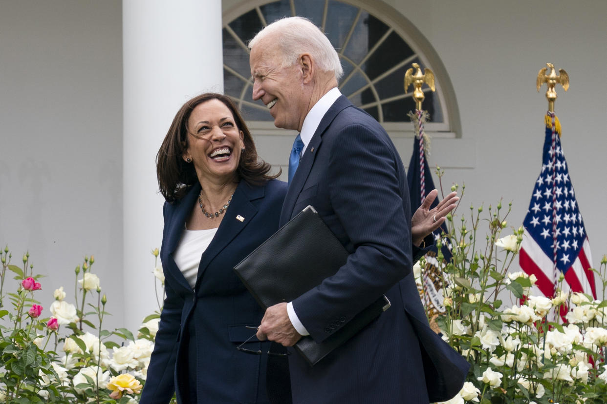 Vice President Kamala Harris and President Joe Biden smile and walk off after speaking about updated guidance on mask mandates, in the Rose Garden of the White House, Thursday, May 13, 2021, in Washington. (Evan Vucci/AP)
