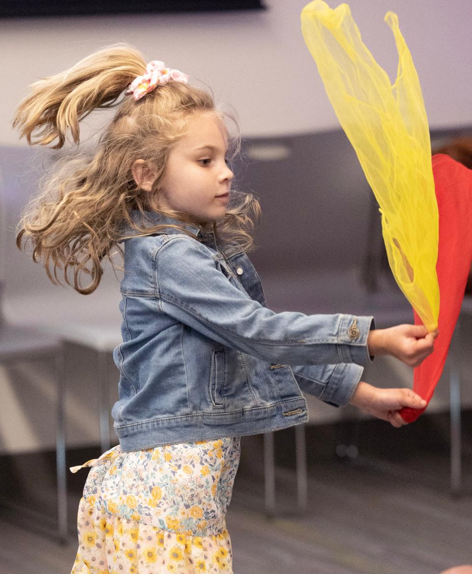 Bella Colaner, 5, dances at the Tiny Tots Prom held at the Stark Library-Jackson Community Branch.