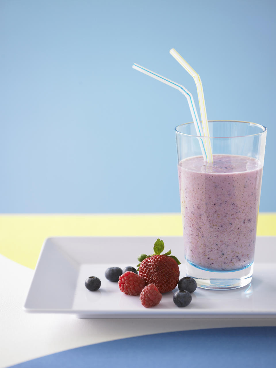 Mixed berry and banana smoothie is on the menu for breakfast. Source: Getty