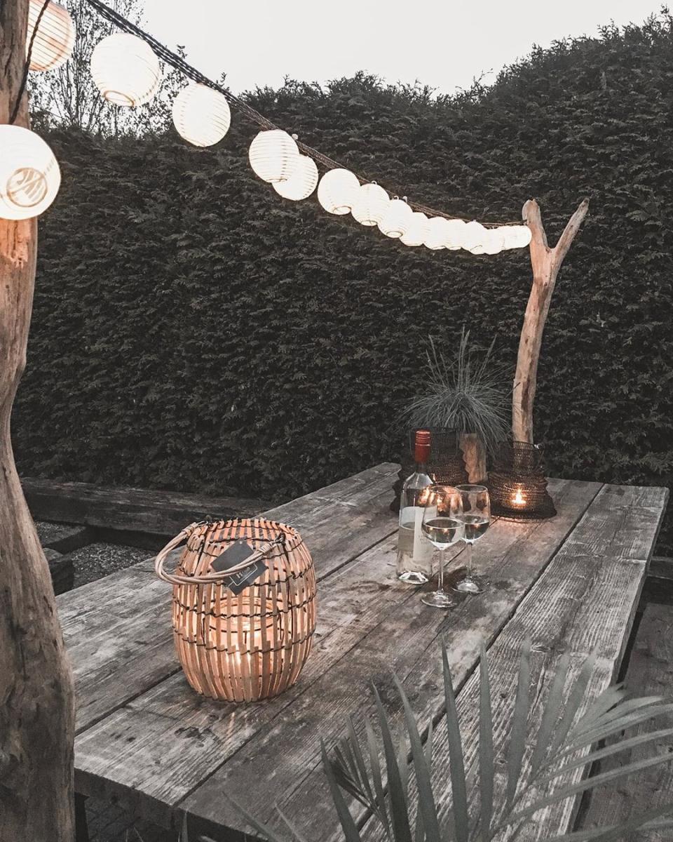 <p>For a more natural vibe, opt for paper ball lights over classic class bulbs. These remind us of beachy nights in the Hamptons and Malibu.</p><p><strong>See more at <a href="https://www.instagram.com/beau_wonen/" rel="nofollow noopener" target="_blank" data-ylk="slk:beau_wonen;elm:context_link;itc:0;sec:content-canvas" class="link ">beau_wonen</a>.</strong></p><p><a class="link " href="https://www.amazon.com/Lantern-String-Lights-Outdoor-Bedroom/dp/B083RT1KCB/?tag=syn-yahoo-20&ascsubtag=%5Bartid%7C10050.g.31137877%5Bsrc%7Cyahoo-us" rel="nofollow noopener" target="_blank" data-ylk="slk:SHOP PAPER STRING LIGHTS;elm:context_link;itc:0;sec:content-canvas">SHOP PAPER STRING LIGHTS</a></p>