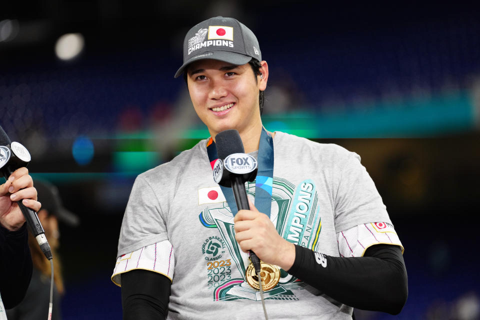 MIAMI, FL - MARCH 21:  Shohei Ohtani #16 of Team Japan talks to the media after Team Japan defeated Team USA in the 2023 World Baseball Classic Championship game at loanDepot Park on Tuesday, March 21, 2023 in Miami, Florida. (Photo by Mary DeCicco/WBCI/MLB Photos via Getty Images)