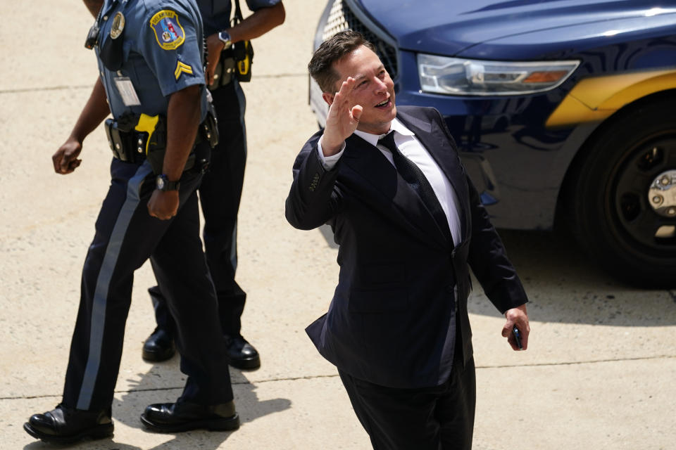 CEO Elon Musk departs from the justice center in Wilmington, Del., Tuesday, July 13, 2021. Testifying for a second day, Musk pushed back again Tuesday against a lawsuit that blames him for engineering Tesla’s 2016 acquisition of a financially precarious company called SolarCity that was marred by conflicts of interest and never generated the profits Musk insisted it would. (AP Photo/Matt Rourke)