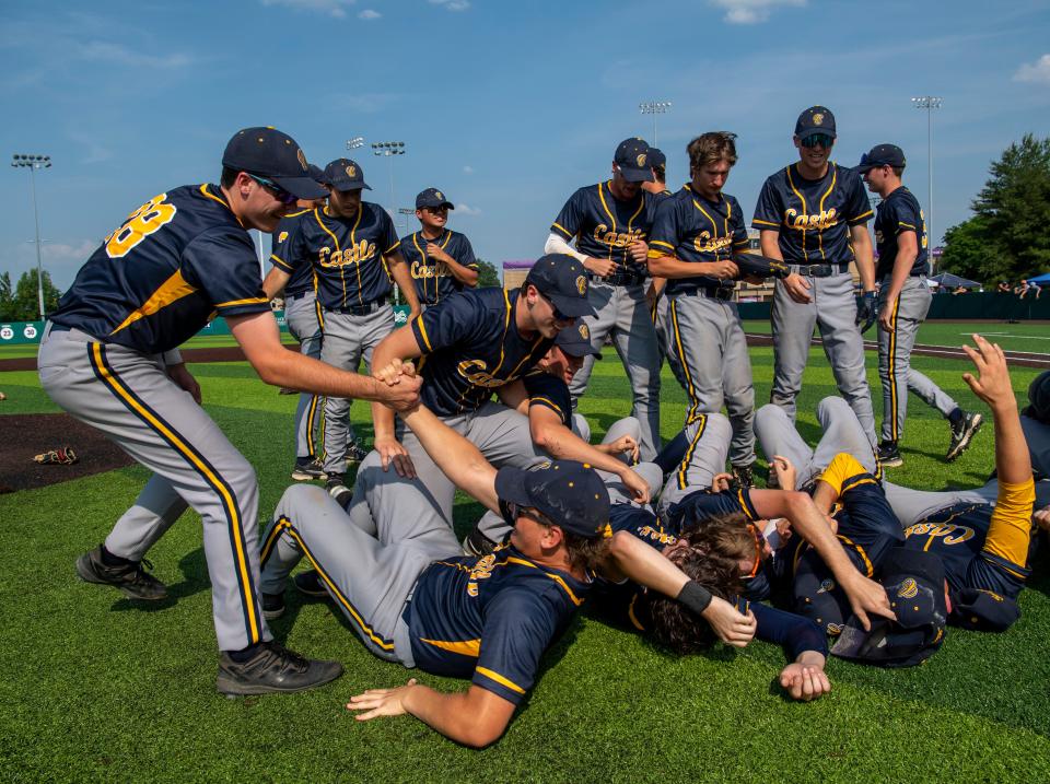 The Castle Knights celebrate their victory over the Jeffersonville Red Devils in the 2023 IHSAA Class 4A Baseball Regional championship at Braun Stadium in Evansville, Ind., Saturday, June 3, 2023.