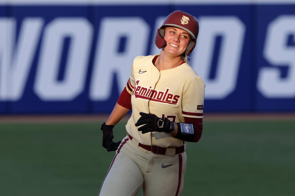 Florida State's Mack Leonard runs the bases after hitting a home run against Oklahoma during the fourth inning of the second game of the NCAA Women's College World Series softball championship series Thursday, June 8, 2023, in Oklahoma City. (AP Photo/Nate Billings)