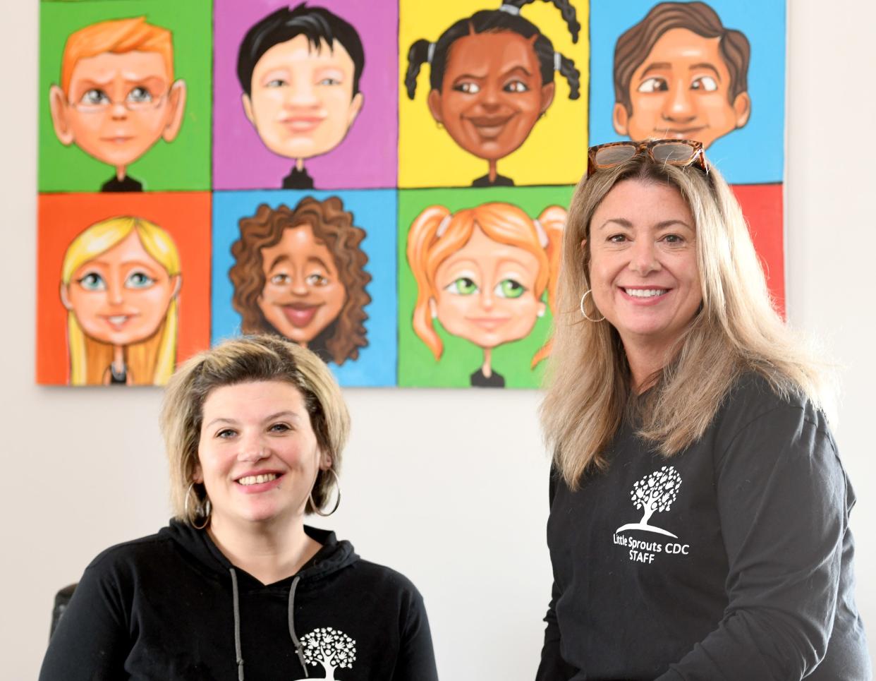 Little Sprouts Daycare & Preschool Director Nicole Muntean (left) and owner Carolyn Denaro talk Tuesday about the expansion of the business to the west side of Massillon. A second Little Sprouts center is slated to open July 10 at 212 Lincoln Way W, which is the former home to Huntington Bank.