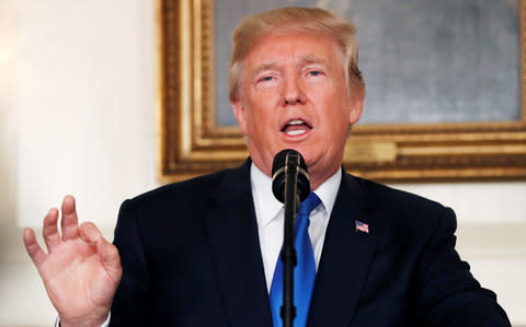 President Donald Trump has threatened to withdraw the US from the nuclear deal - Credit: Kevin Lamarque/Reuters