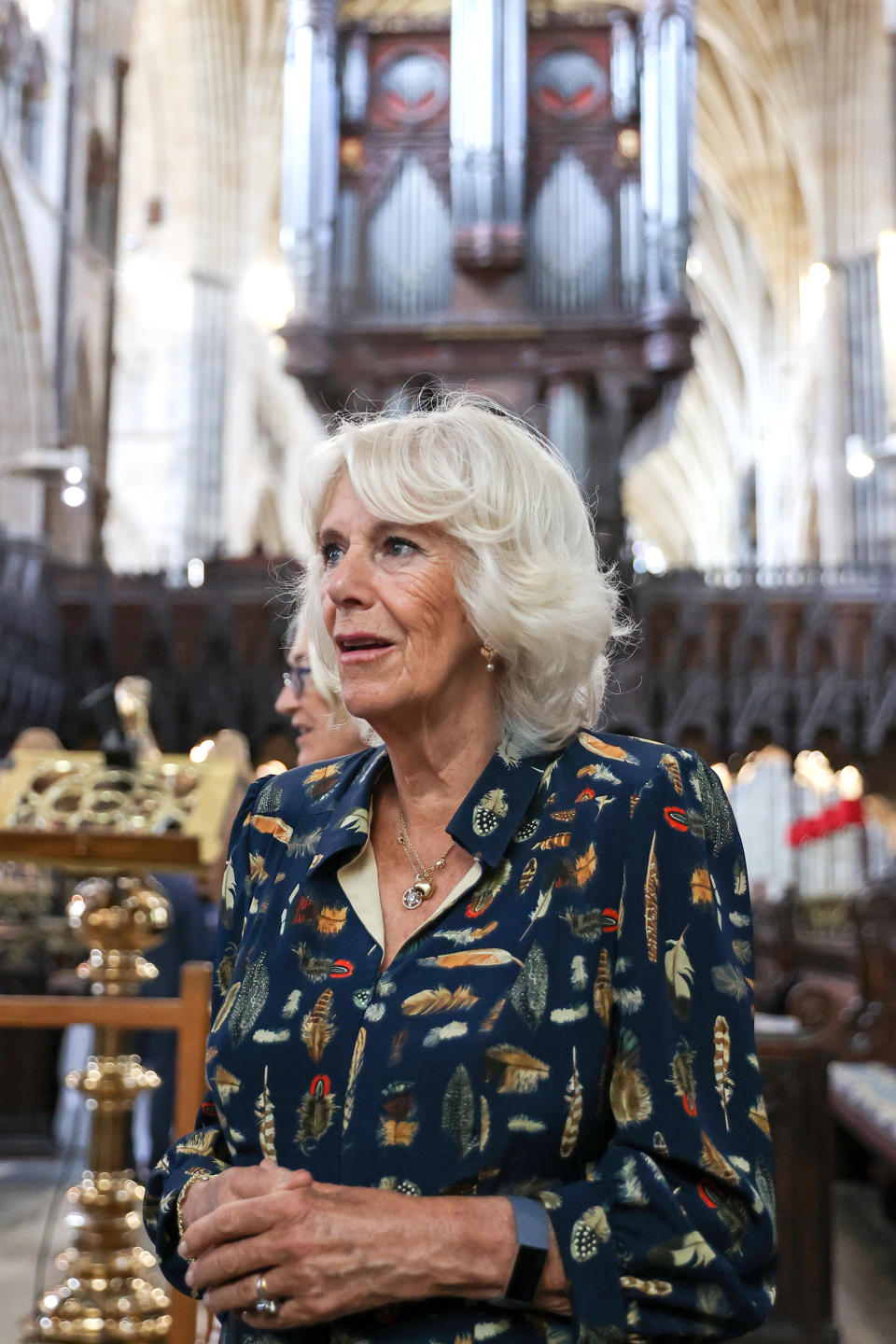 EXETER, UNITED KINGDOM - JULY 19: Camilla, Duchess of Cornwall during a visit to Exeter Cathedral on July 19, 2021 in Exeter, United Kingdom. Founded in 1050, The Cathedral continues to offer daily Christian worship and choral music, alongside its roles as a community hub, heritage destination and venue for concerts and events. It is home to an extensive library and archive, housing important treasures such as the Exeter Book – thought to be the world’s oldest surviving book of English literature. The visit celebrates the city’s designation as a UNESCO City of Literature and launch of The Royal College of Nursing’s Prince of Wales Nursing Cadet Scheme in England.  (Photo by Chris Jackson - WPA Pool/Getty Images)