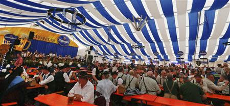 Residents party during a Sunday Parade in Eichstaett September 8, 2013. REUTERS/Michael Dalder