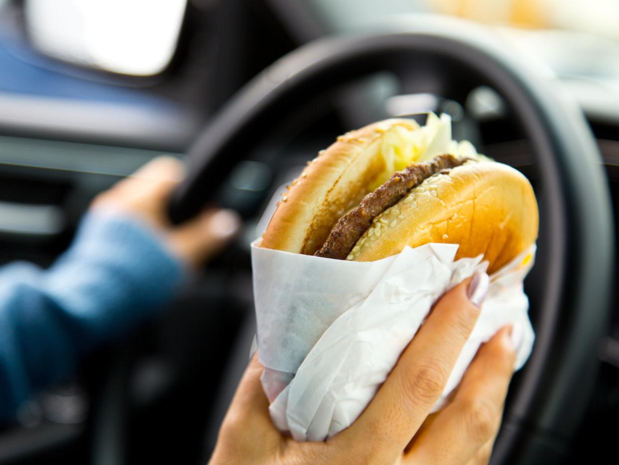 Eating Hamburger while driving