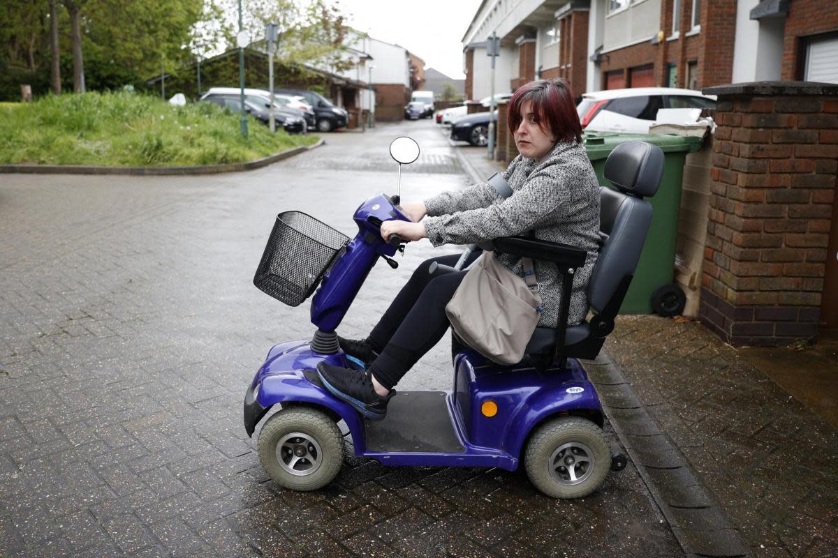 Tara leaves her home in the Roundshaw estate in Beddington in south London <i>(Image: Facundo Arrizabalaga/MyLondon)</i>