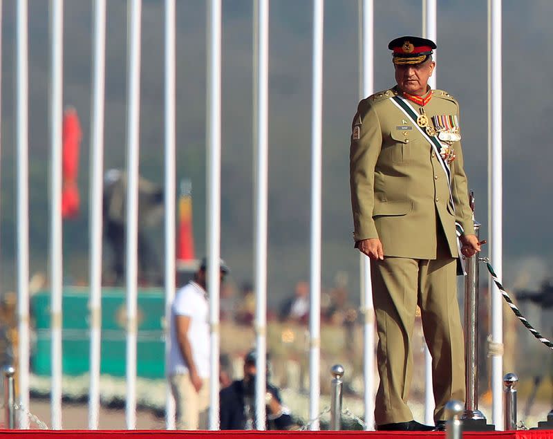 FILE PHOTO: Pakistan's Army Chief of Staff Lieutenant General Qamar Javed Bajwa arrives to attend the Pakistan Day military parade in Islamabad