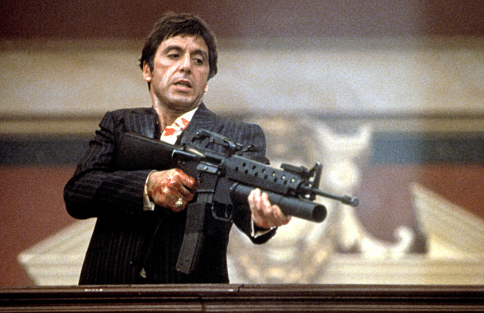 Al Pacino shooting a gun.