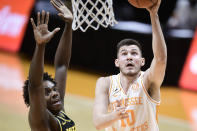 Tennessee forward John Fulkerson (10) shoots during an NCAA college basketball game in Knoxville, Tenn., Saturday, Jan. 23, 2021. (Calvin Mattheis/Knoxville News Sentinel via AP, Pool)