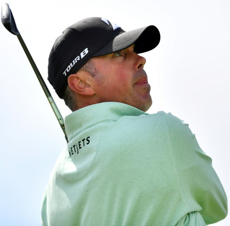 US golfer Matt Kuchar watches his iron shot from the 4th tee on July 20, 2017