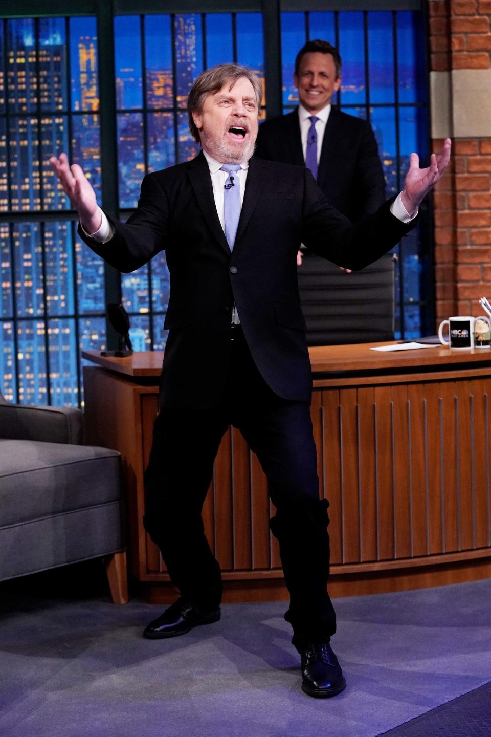 Mark Hamill rouses the crowd during an interview on Tuesday’s episode of <i>Late Night with Seth Meyers. </i>