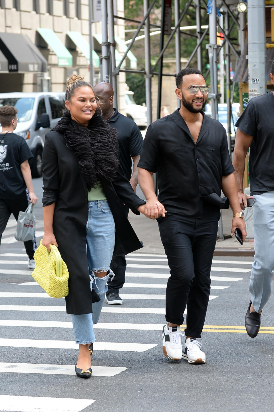 Chrissy Teigen and John Legend walk to a lunch date in New York City. - Credit: Elder Ordonez / SplashNews.com