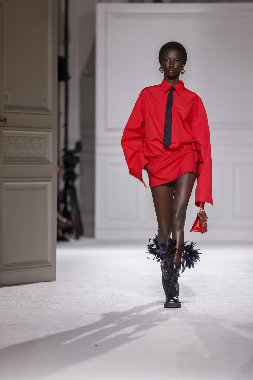 A model wears a creation as part of the Valentino Fall/Winter 2023-2024 ready-to-wear collection presented Sunday, March 5, 2023 in Paris. (Vianney Le Caer/Invision/AP)