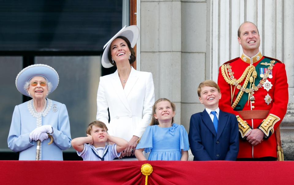 Queen Elizabeth II, Prince Louis of Cambridge, Catherine, Duchess of Cambridge, Princess Charlotte of Cambridge, Prince George of Cambridge and Prince William, Duke of Cambridge watch a flypast from the balcony of Buckingham Palace during Trooping the Colour on June 2, 2022 in London, England. Trooping The Colour, also known as The Queen's Birthday Parade, is a military ceremony performed by regiments of the British Army that has taken place since the mid-17th century. It marks the official birthday of the British Sovereign. This year, from June 2 to June 5, 2022, there is the added celebration of the Platinum Jubilee of Elizabeth II in the UK and Commonwealth to mark the 70th anniversary of her accession to the throne on 6 February 1952.