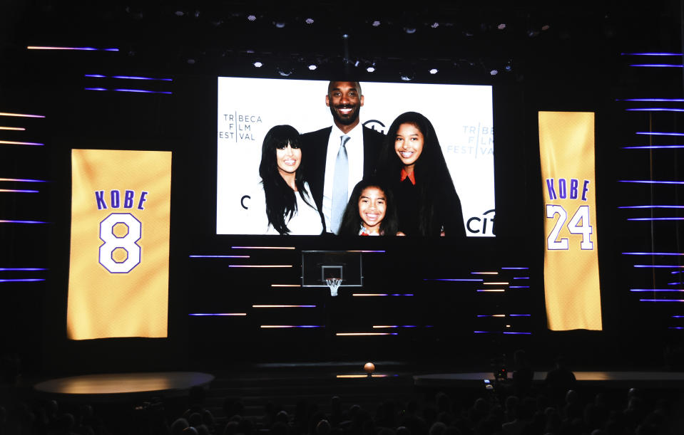 An image of Vanessa Bryant, from left, Kobe Bryant, Natalia Bryant, and Gianna Bryant appears during the Kobe Bryant tribute segment at the 51st NAACP Image Awards at the Pasadena Civic Auditorium on Saturday, Feb. 22, 2020, in Pasadena, Calif. (AP Photo/Chris Pizzello)