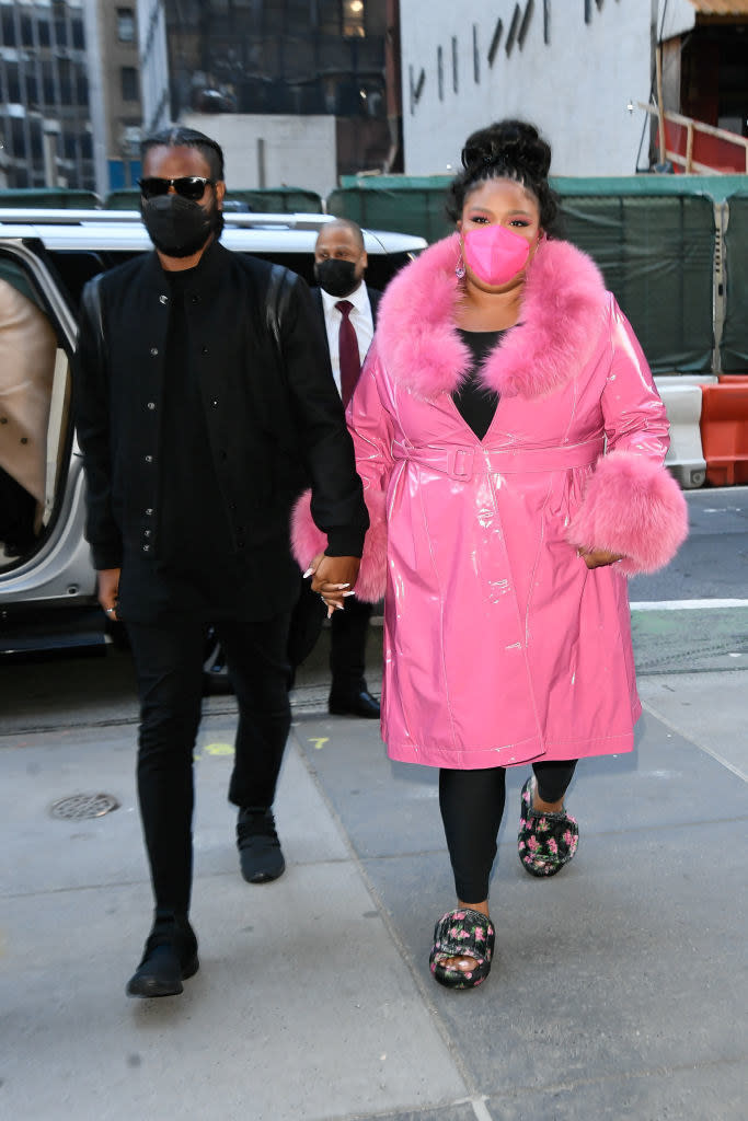 the couple exits their car to head somewhere