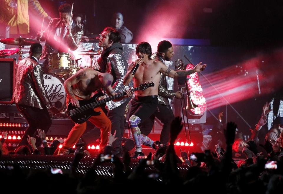 The Red Hot Chili Peppers perform during the halftime show of the NFL Super Bowl XLVIII football game between the Seattle Seahawks and the Denver Broncos Sunday, Feb. 2, 2014, in East Rutherford, N.J. (AP Photo/Kathy Willens)