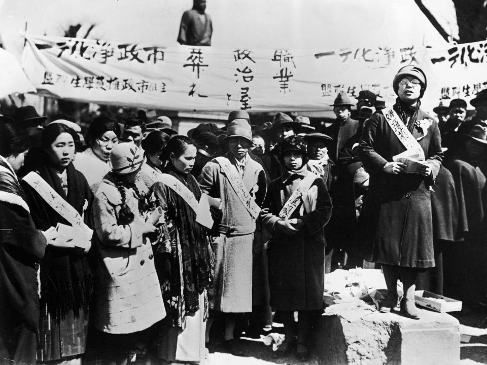 Japanese women hold a demonstration to protest low wages paid to female factory workers.