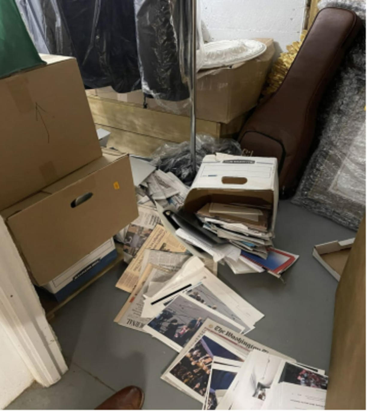 This image, contained in the indictment against former President Donald Trump, shows boxes of records on Dec. 7, 2021, in a storage room at Trump's Mar-a-Lago estate in Palm Beach, Fla., that had fallen over with contents spilling onto the floor. Trump is facing 37 felony charges related to the mishandling of classified documents according to an indictment unsealed Friday, June 9, 2023. (Justice Department via AP file)
