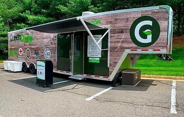 GreenDrop Realty drop-off trailer.