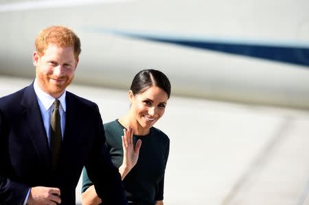 Britain's Prince Harry and his wife Meghan, the Duke and Duchess of Sussex, arrive at the airport for a two-day visit to Dublin, Ireland July 10, 2018. REUTERS/Cathal McNaughton