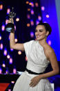 Actress Penelope Cruz holds the Donostia Award during an award ceremony at the 67th San Sebastian Film Festival, in San Sebastian, northern Spain Friday, Sept. 27, 2019. (AP Photo/Alvaro Barrientos)