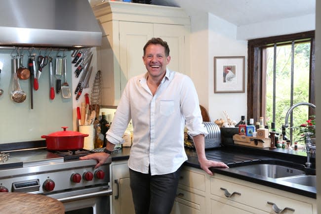 matt smiling in kitchen