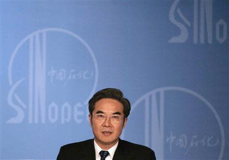 Sinopec Corp's then chairman Chen Tonghai announces the company's annual results in Hong Kong, in this April 10, 2007 file picture. Sinopec vowed to step up its fight against graft after former chairman Chen Tonghai was given a suspended death sentence in 2009 for taking $32 million in bribes. China has taken steps to curb graft in public procurement. But industry officials and analysts say the process is still riddled with graft partly because China's rapid economic growth has fuelled a surge in fixed asset investment by the government and state firms that have often escaped proper oversight. To match story CHINA-PROCUREMENT/ REUTERS/Bobby Yip/Files (CHINA - Tags: ENERGY BUSINESS HEADSHOT CRIME LAW)