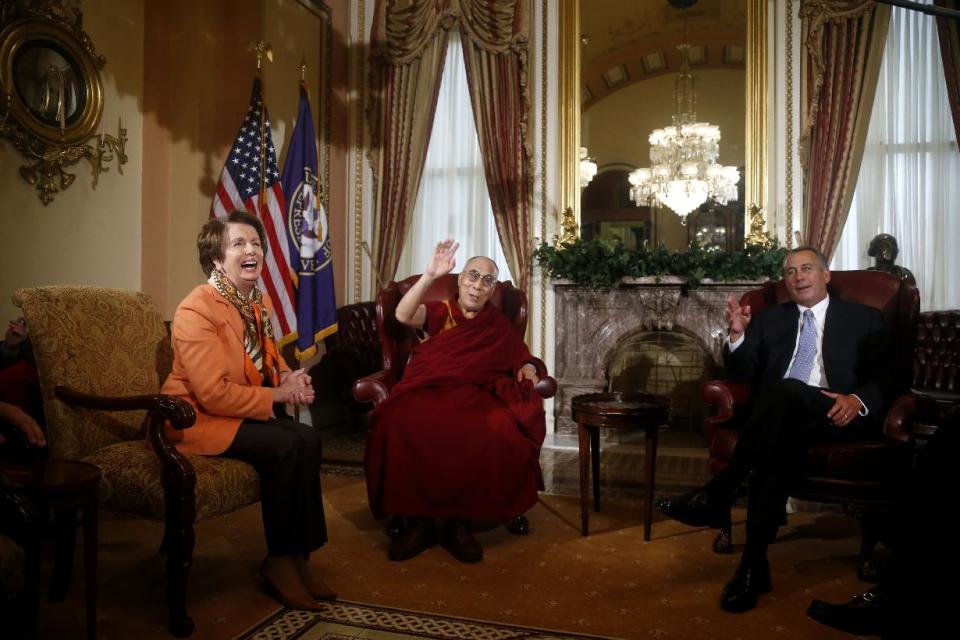 Tibetan spiritual leader the Dalai Lama meets with House Speaker John Boehner of Ohio and House Minority Leader Nancy Pelosi of Calif., on Capitol Hill in Washington, Thursday, March 6, 2014. (AP Photo/Charles Dharapak)