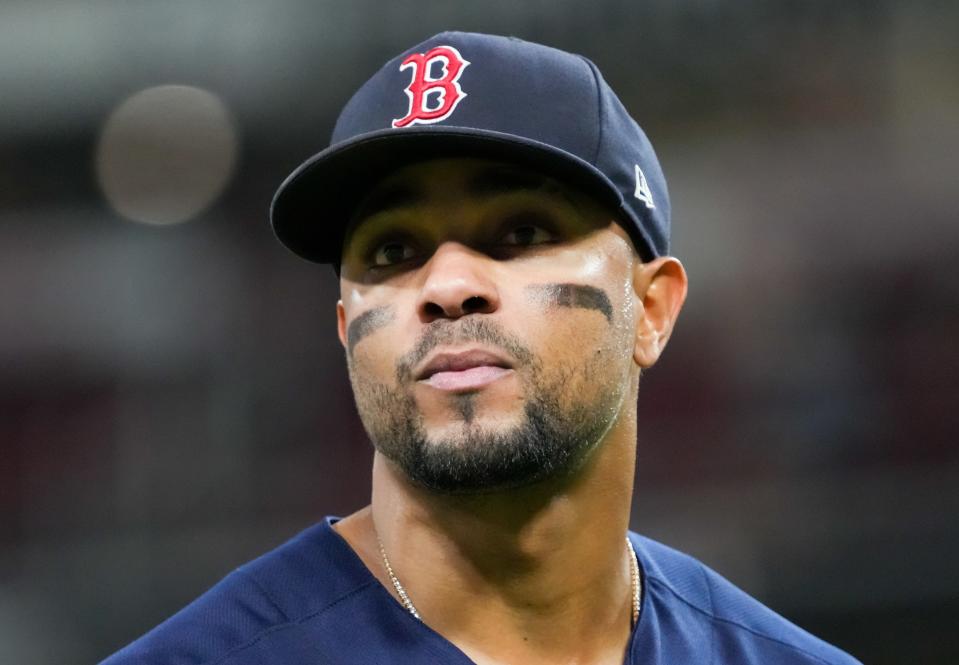 Xander Bogaerts #2 of the Boston Red Sox walks across the field in the fifth inning against the Cincinnati Reds at Great American Ball Park on September 20, 2022 in Cincinnati, Ohio.