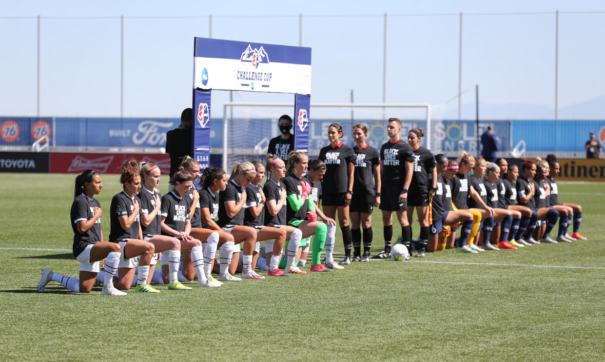 HERRIMAN, UT - JUNE 27: Portland Thorns FC Starting Eleven kneel in support of Black Lives Matter before a game between Portland Thorns FC and North Carolina Courage at Zions Bank Stadium on June 27, 2020 in Herriman, Utah. (Photo by Robert Gray/ISI Photos/Getty Images).