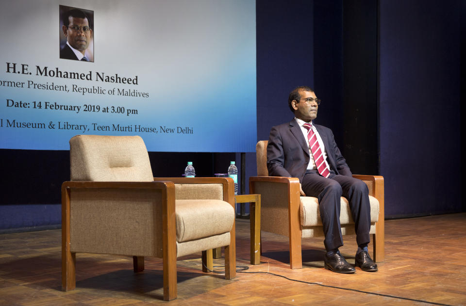 Former Maldives President Mohamed Nasheed takes a seat before delivering a lecture on climate change in New Delhi, India, Thursday, Feb. 14, 2019. In an interview to The Associated Press Thursday after giving a climate change lecture, Nasheed said the Indian Ocean archipelago nation is seeking tenders for renewable energy projects to help lessen the burden of foreign debt. (AP Photo/Manish Swarup)