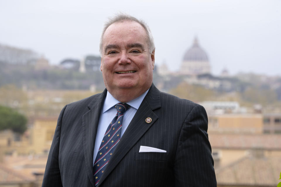 John Dunlap poses at the Sovereign Military Order of Malta's headquarters in Rome, Friday, March 31, 2023. Dunlap, a Canadian lawyer who found his vocation ministering to AIDS patients in Harlem has been elected Wednesday, May 3, 2023, the grand master of the Knights of Malta, the first non-European and first non-aristocratic head of the ancient Catholic order that provides humanitarian aid around the world. (AP Photo/Domenico Stinellis)