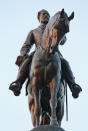 FILE - In this July 19, 2017 file photo a statue of Confederate Gen. Robert E. Lee, stands on Monument Avenue in Richmond, Va. If a court clears the way for the state of Virginia to take down one of the country's most prominent Confederate statues, contractors will also be removing something else from the enormous monument: a 134-year-old time capsule rumored to contain a valuable and historically significant photo of deceased President Abraham Lincoln. (AP Photo/Steve Helber)